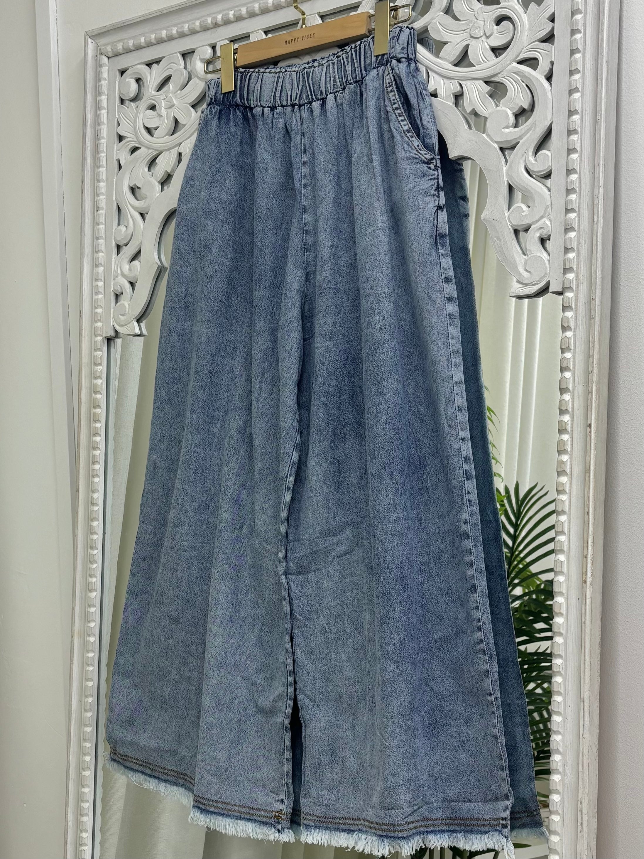 Flare Elastic Ripped Denim Jeans