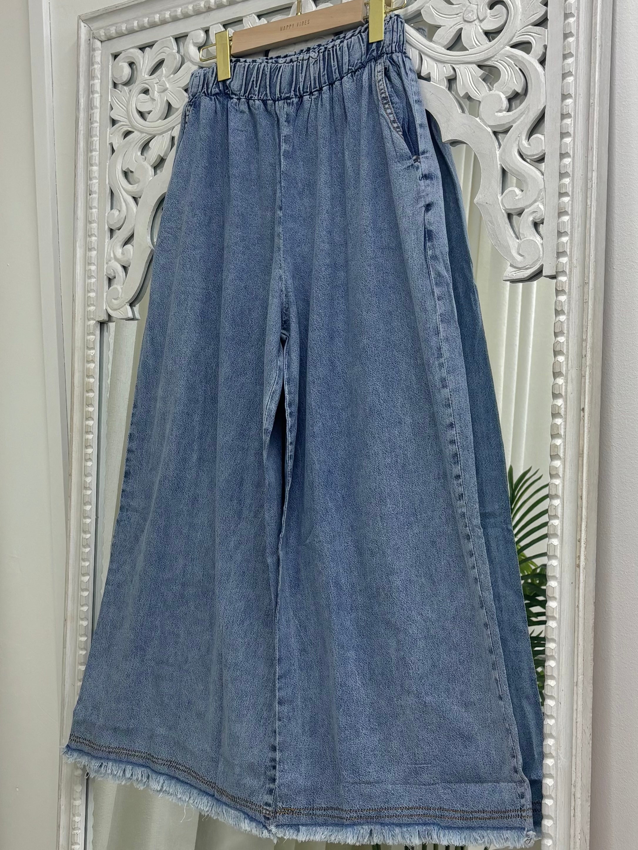 Flare Elastic Ripped Denim Jeans